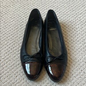 Elegant Black and Brown Stuart Weitzman Flats